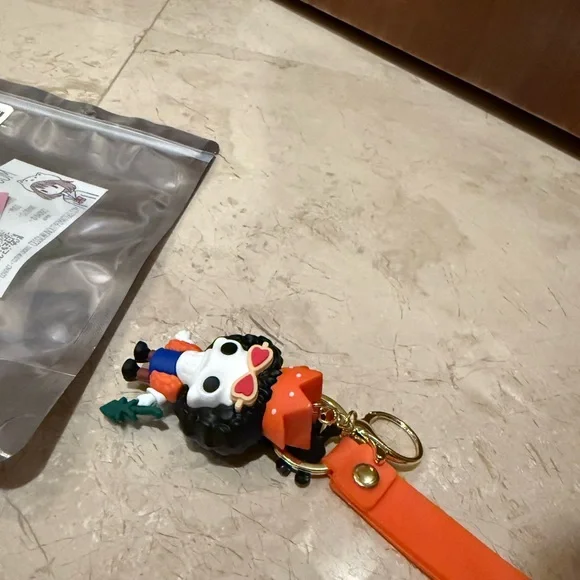 Skull Keychain with Orange and Blue Accents - Picture 3 of 5